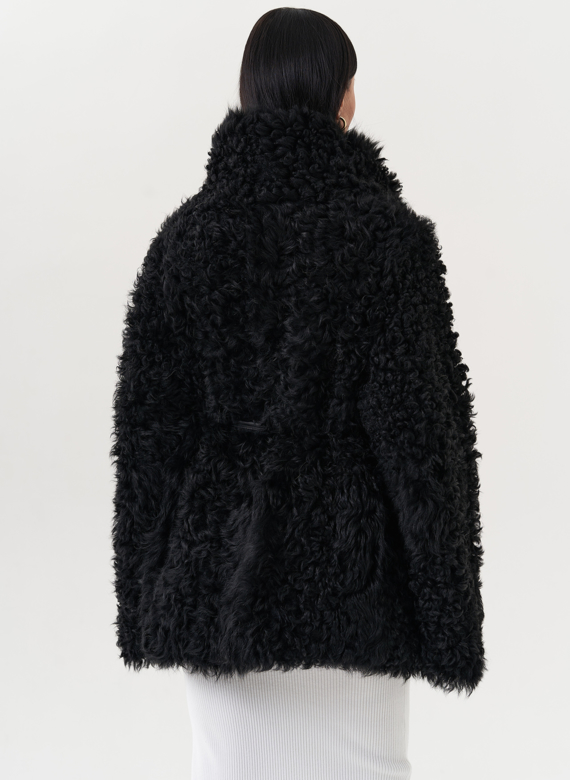 Двухсторонняя дубленка черного цвета
